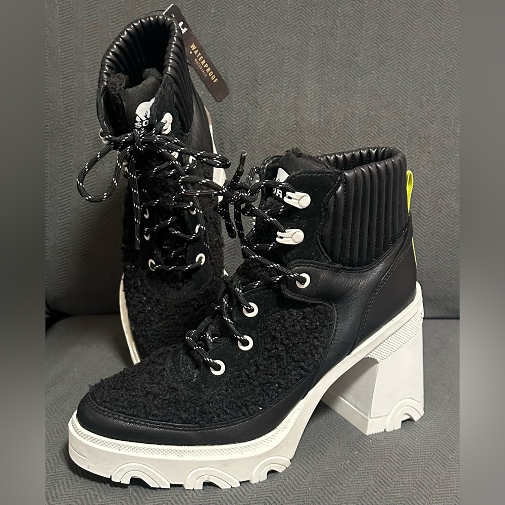 Sorel Women's Brex Cozy Lace Heel Boots in a black and white colorway size 8.5